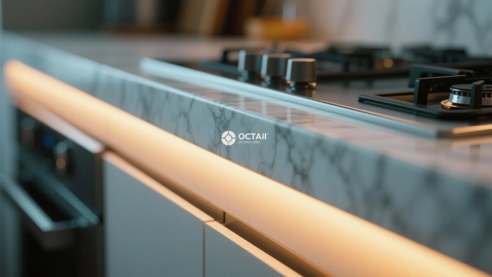 Modern marble countertop with built in light strip glowing under a gas stove and oven