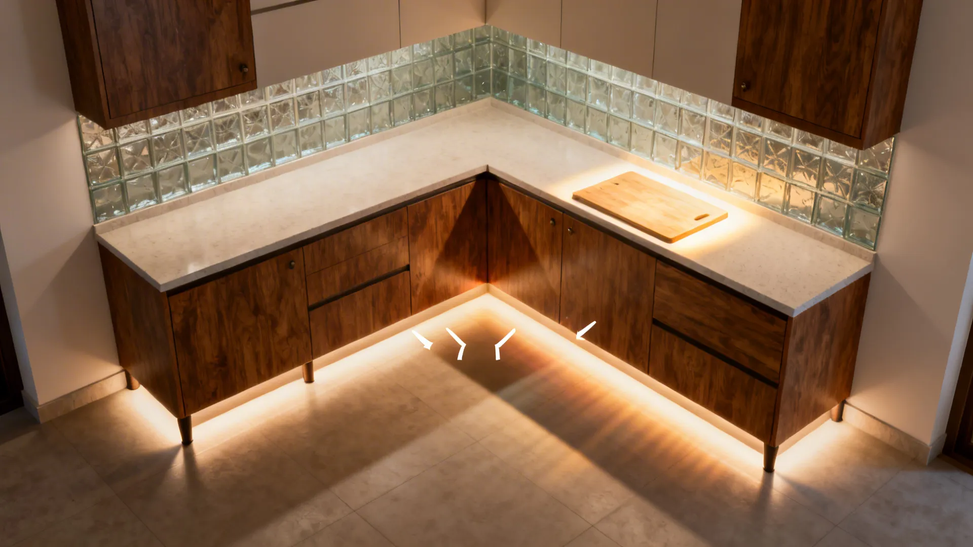 Top-down view showing even under-cabinet lighting across an L-shaped counter.