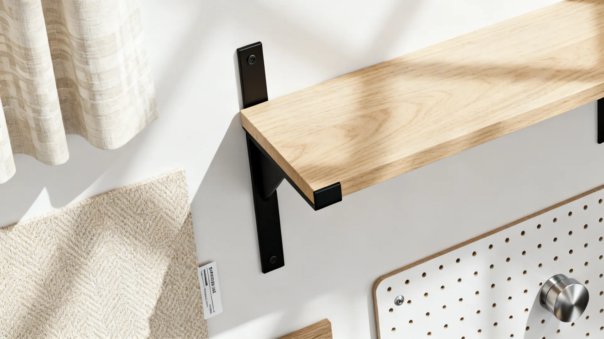 Flat lay with wood shelf, neutral curtain fabric, black brackets, stainless swatch, and labels.