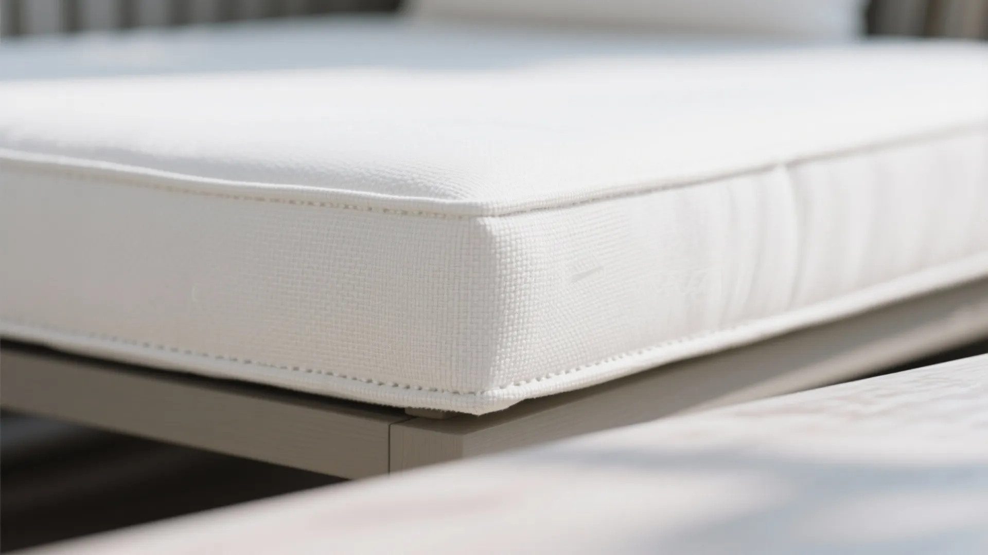 2. Upholstered White Bench with Stain-Resistant Fabric