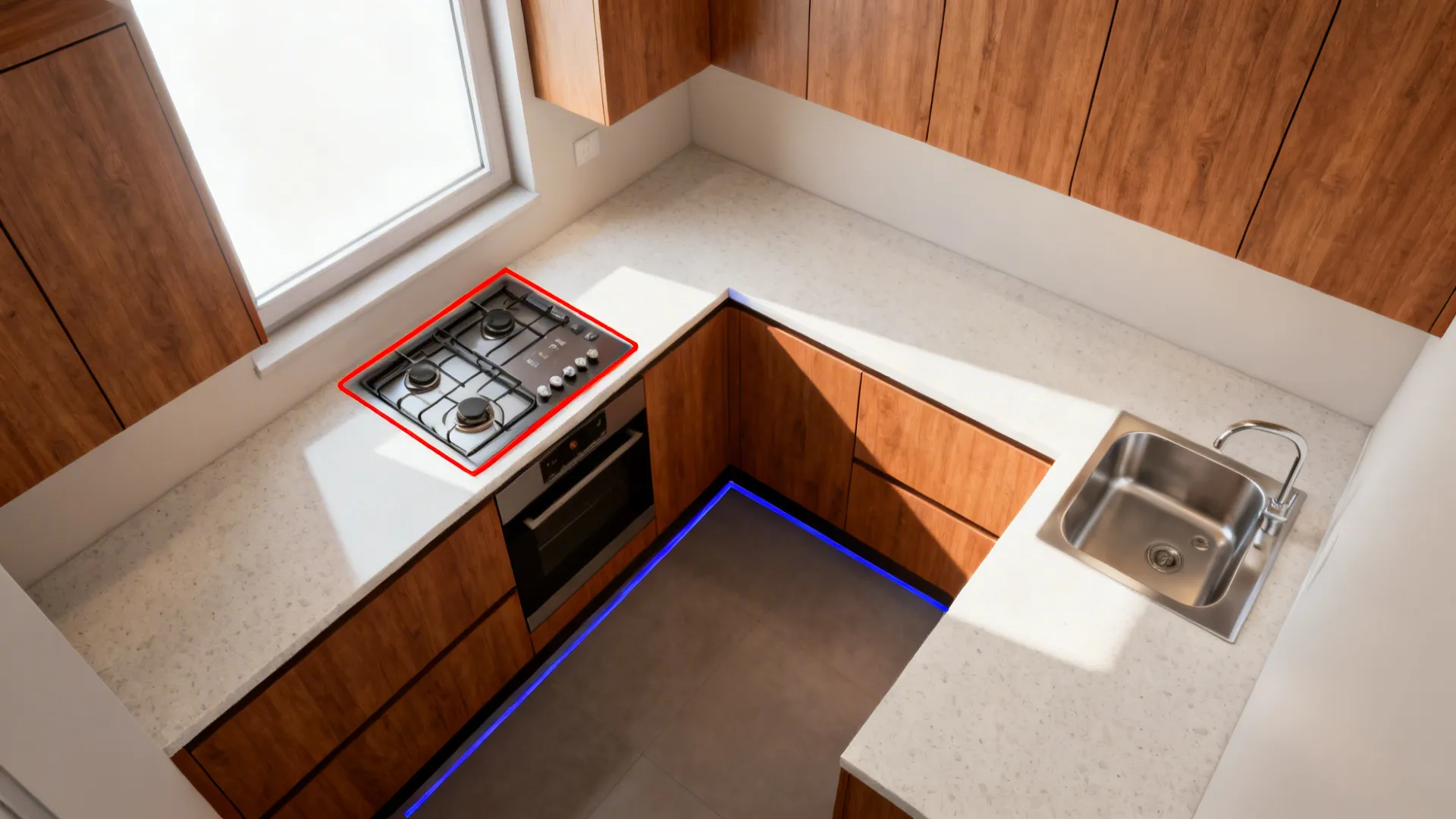 Top-down view showing Vastu layout with southeast hob and northeast sink in an L-shaped kitchen