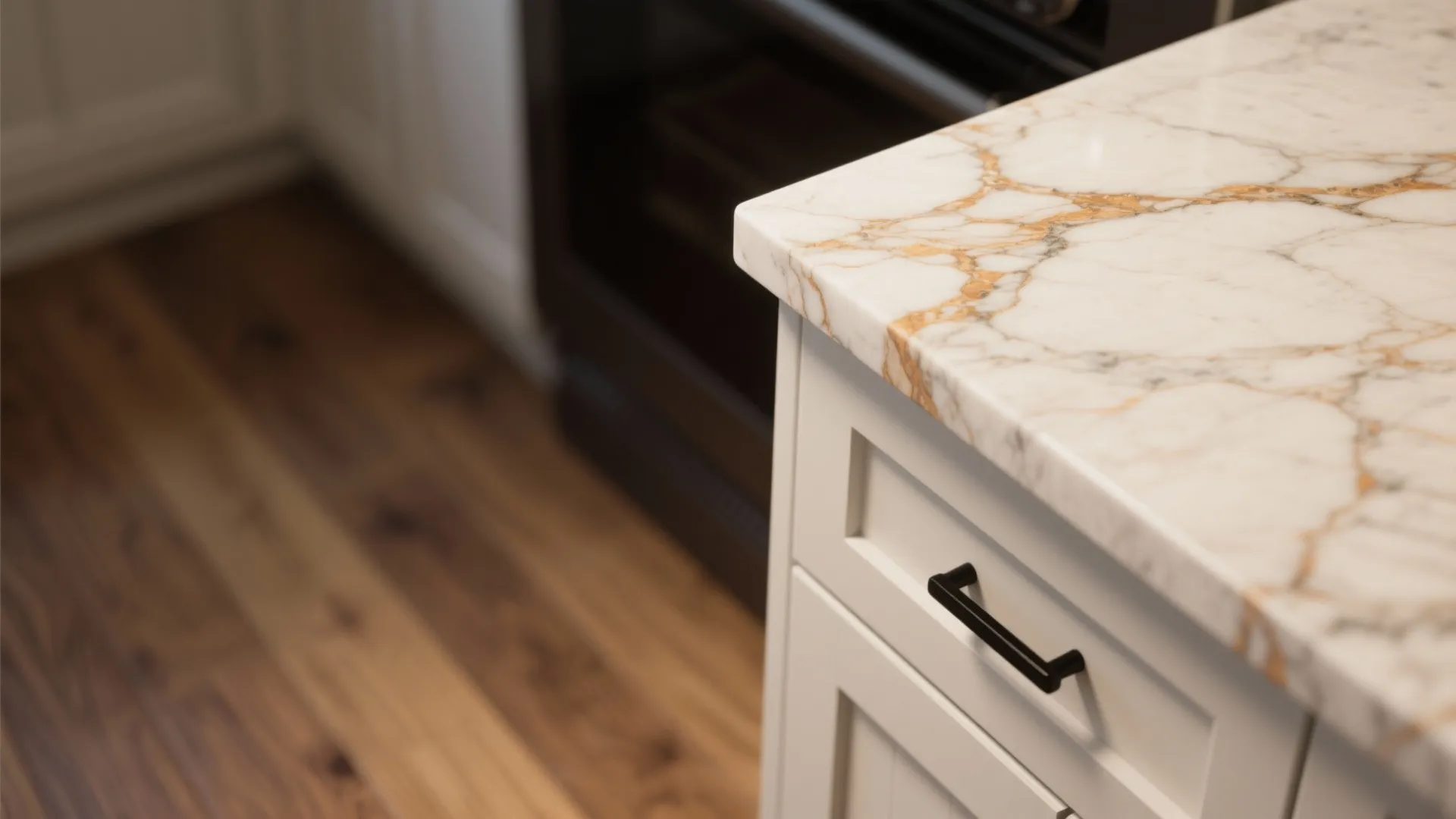 1. Warm veined quartz on white shaker cabinets