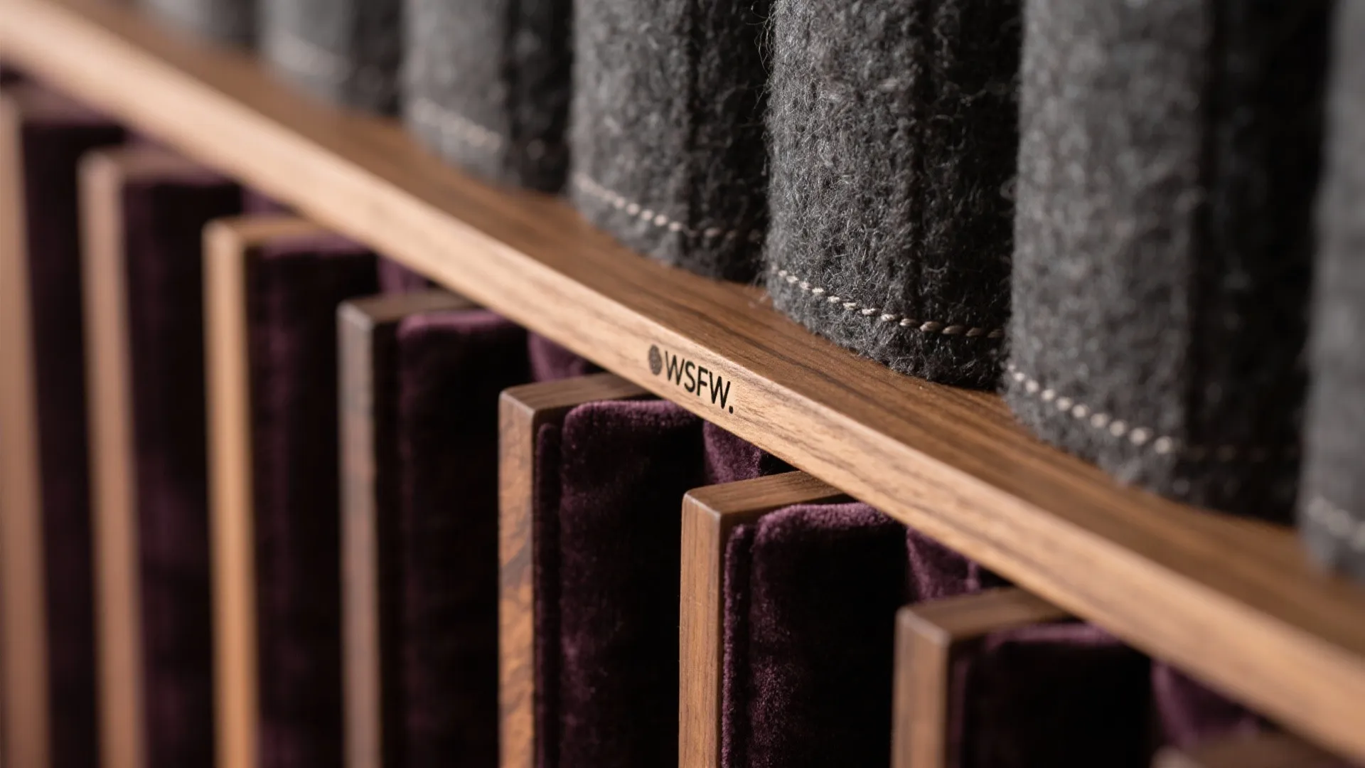 Close up of purple velvet fabric and grey material samples for interior design material choice