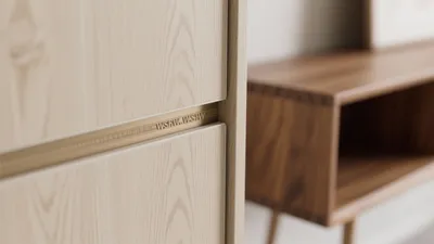 Modern Wooden Cabinet Detail with Gold Accent