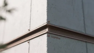 Modern Concrete Wall Detail with Brass Trim