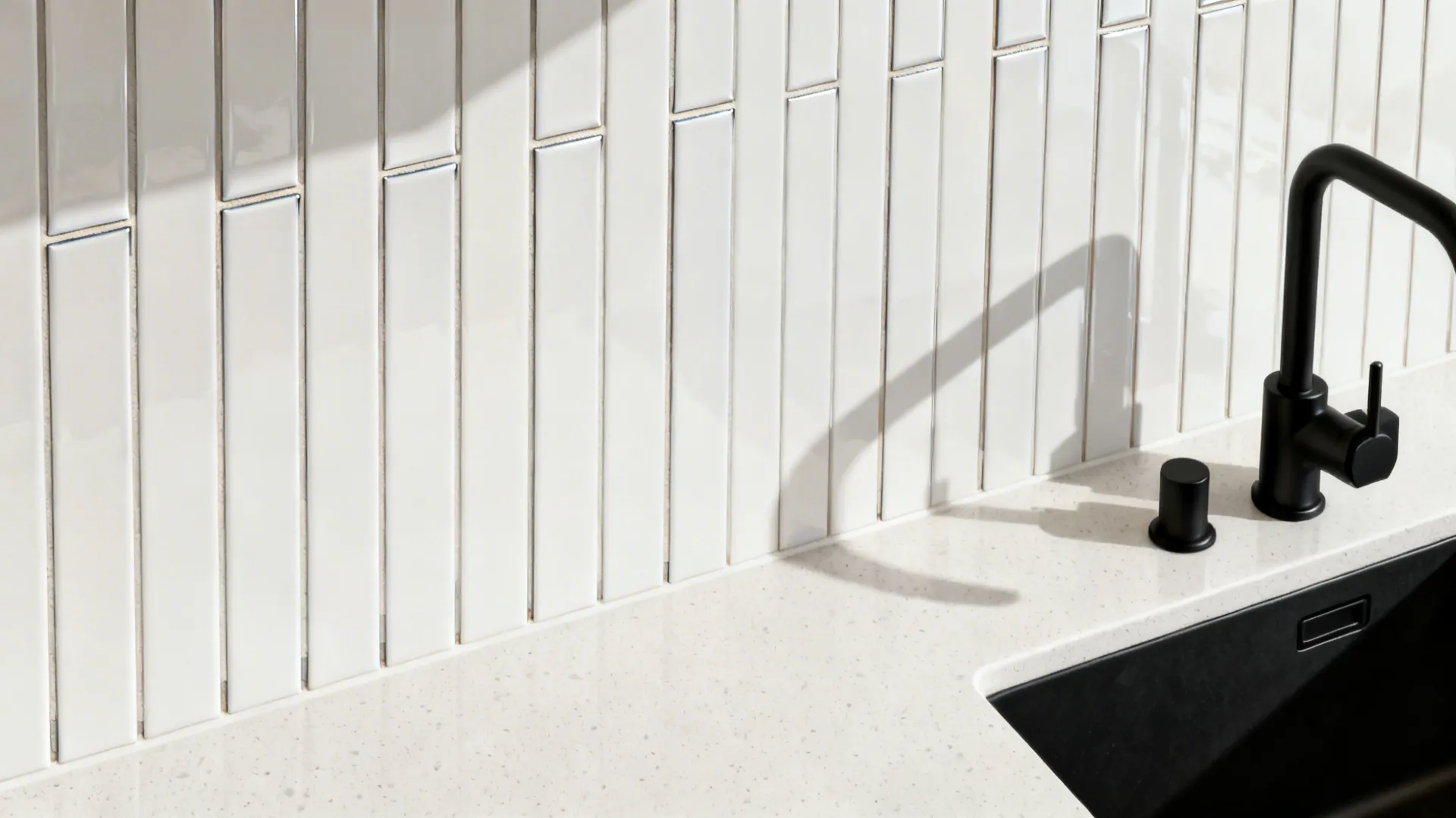 Top-down view of vertical stacked white tiles with tight 1/16-inch grout joints