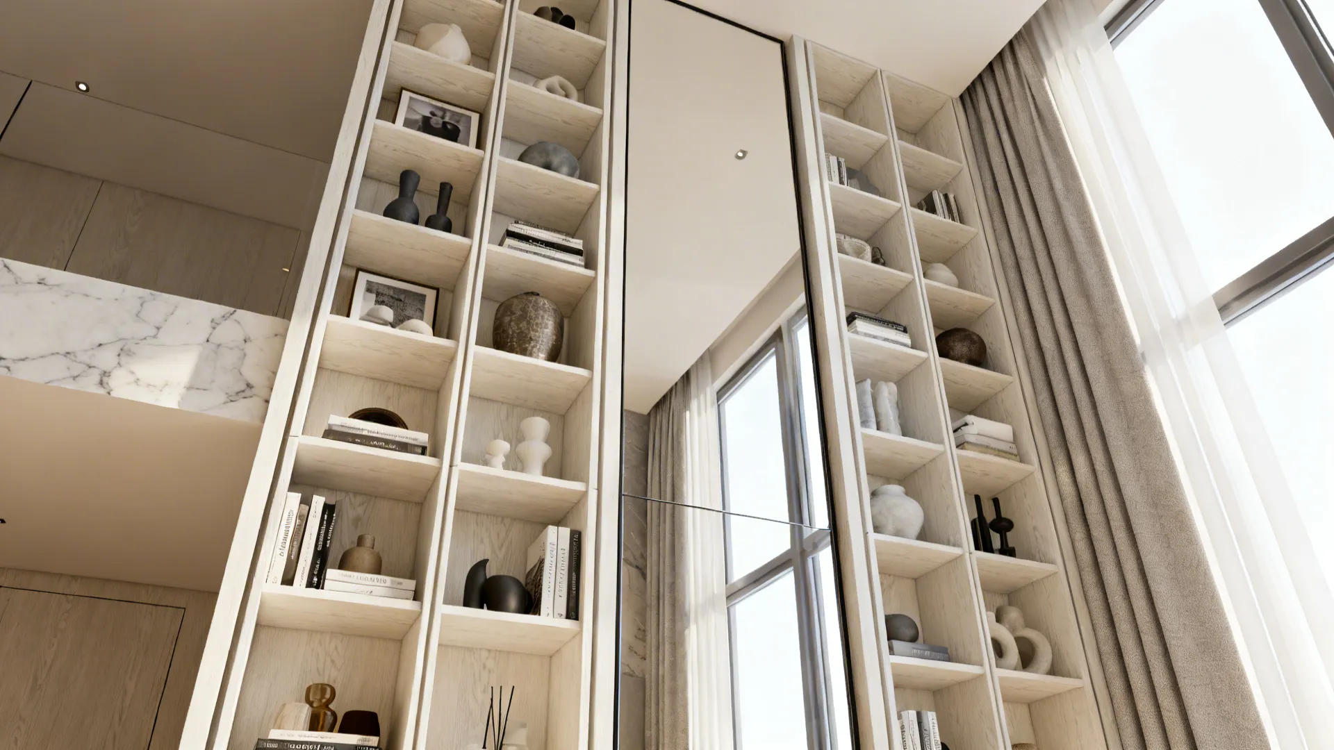 Tall slim shelving and a floor-to-ceiling mirror creating visual height in a small living room.