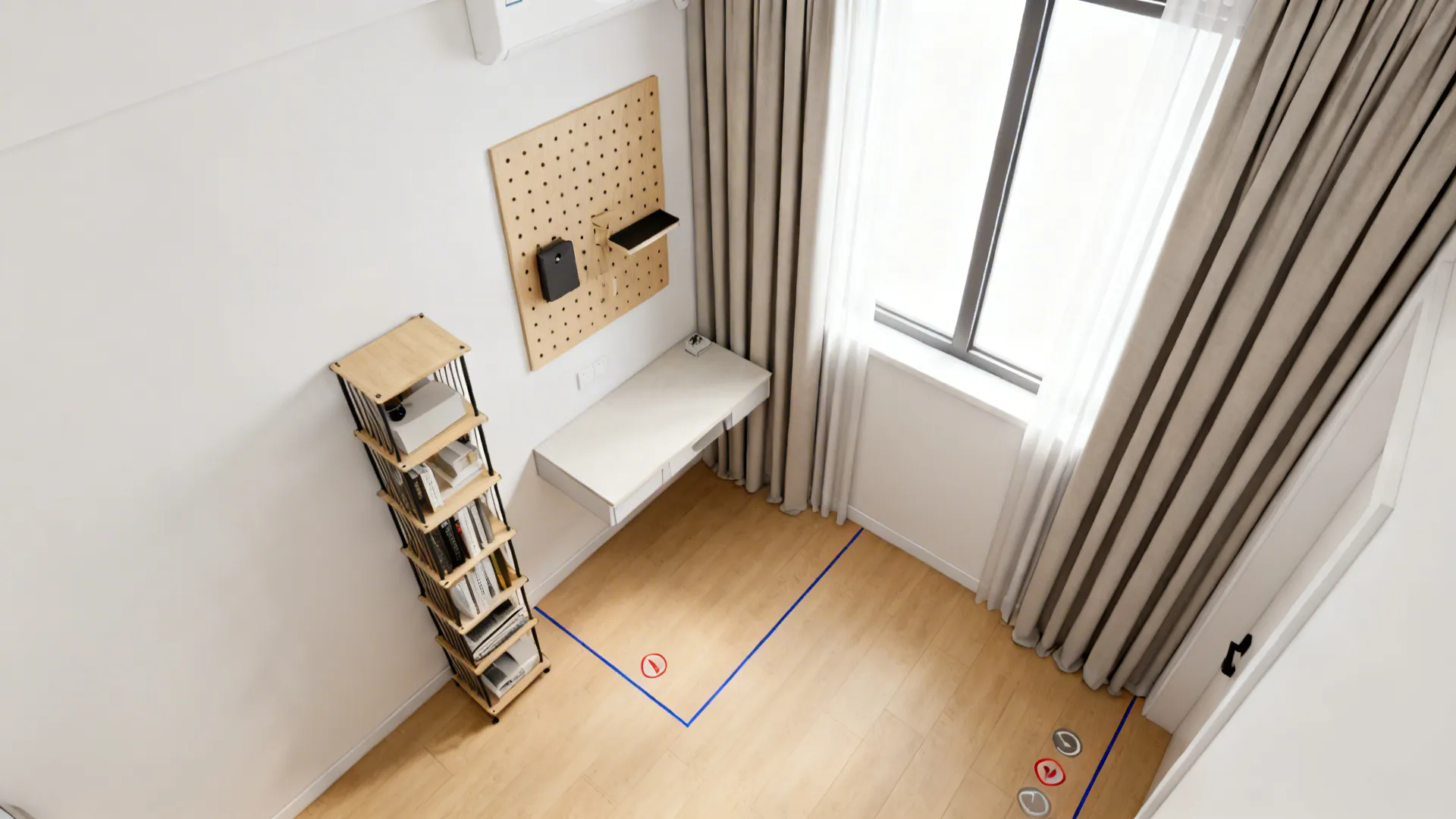 Overhead view of a small studio corner with pegboard, tall shelves, and high-mounted drapes.