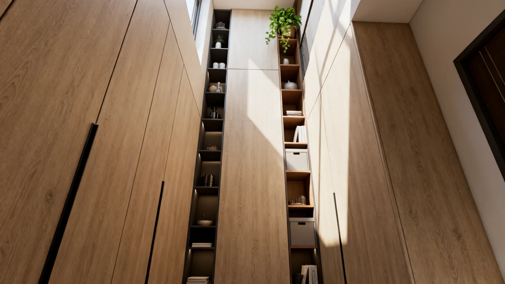 Tall cabinets and open shelving in a studio drawing the eye upward and keeping floors clear.