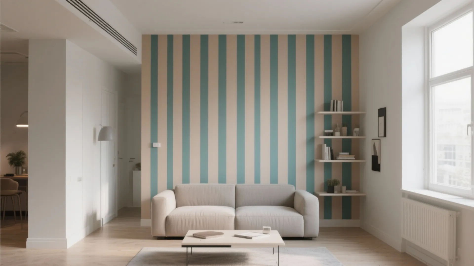 Small living room with tall vertical striped accent wall in neutral and muted teal, creating a loft-like feel.