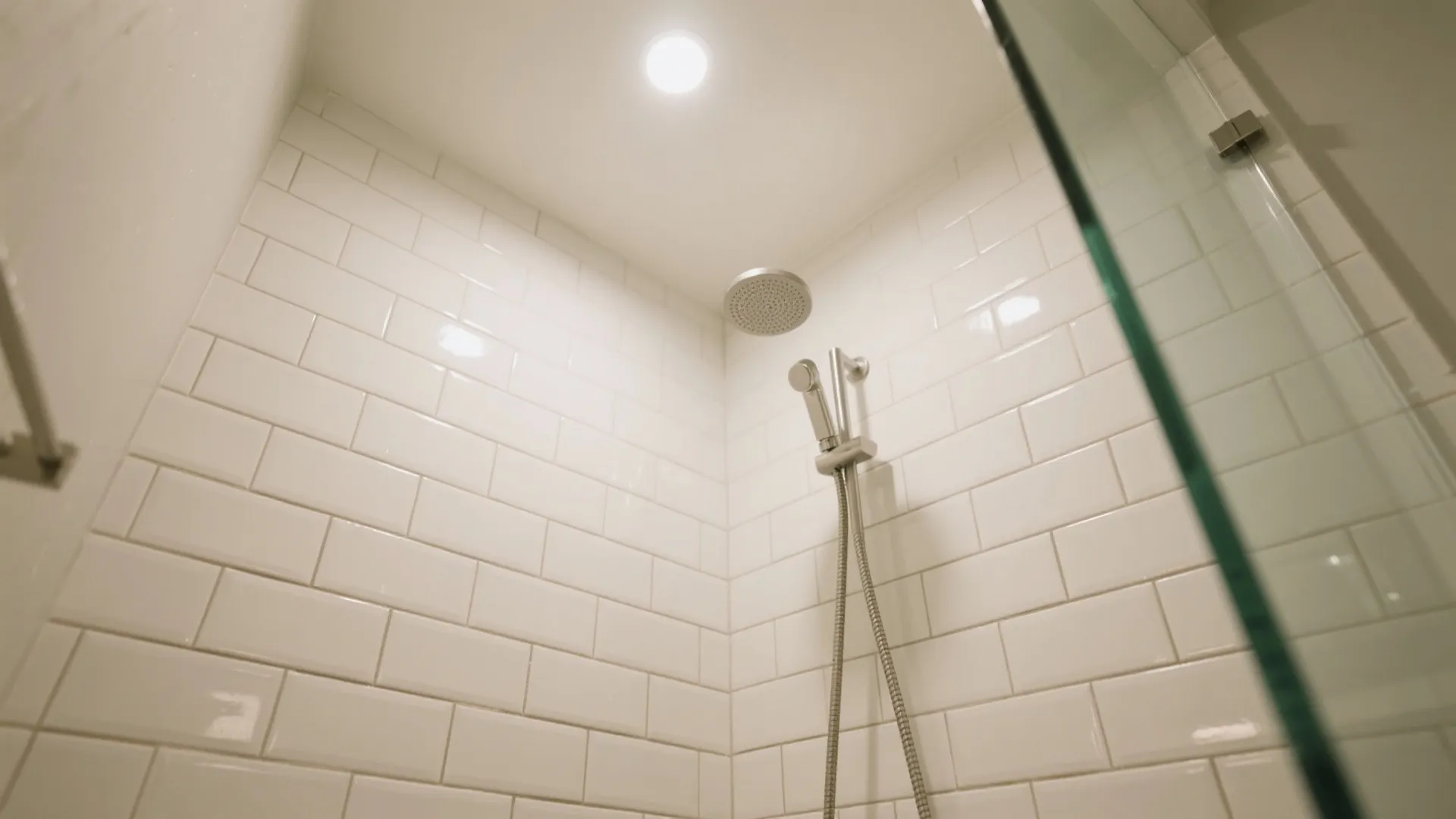 Vertical subway tiles to heighten low ceilings