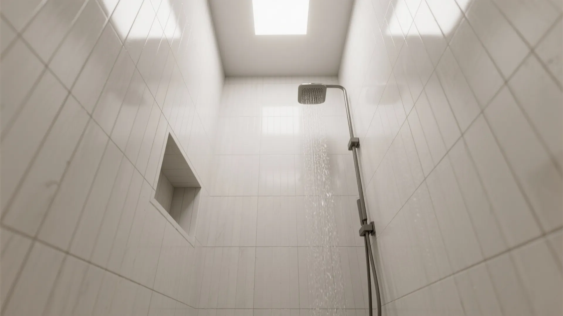 Modern shower room featuring white vertical wall tiles with running water and a ceiling light