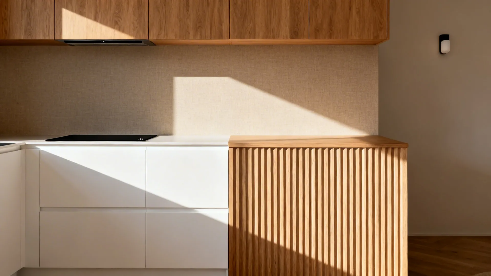 Warm kitchen interior with white cabinets, wooden wall panel, wood upper storage, and sunlight shadows
