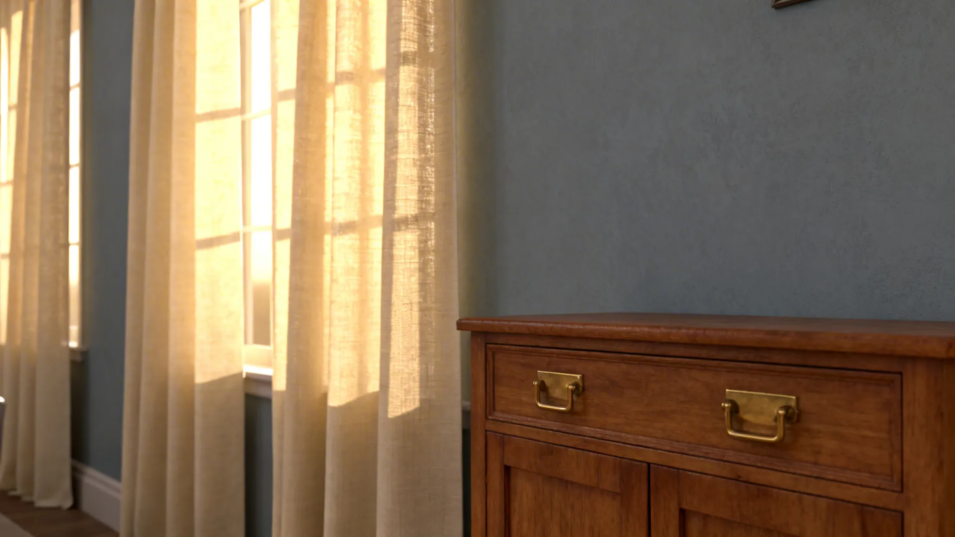 Creamy linen curtains against grey walls with oak and brass accents creating a warm atmosphere