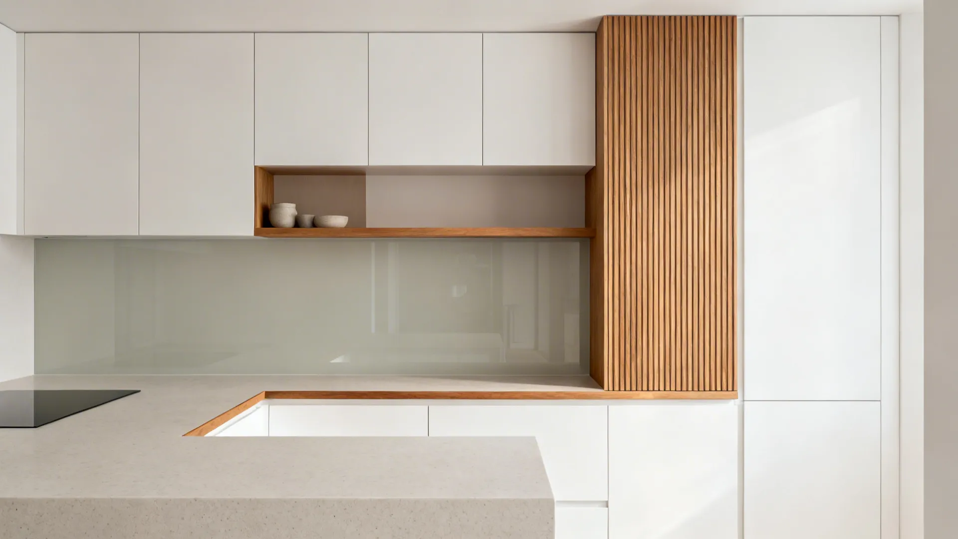 Minimalist 6x6 kitchen with selective warm wood accents balanced with matte white surfaces.