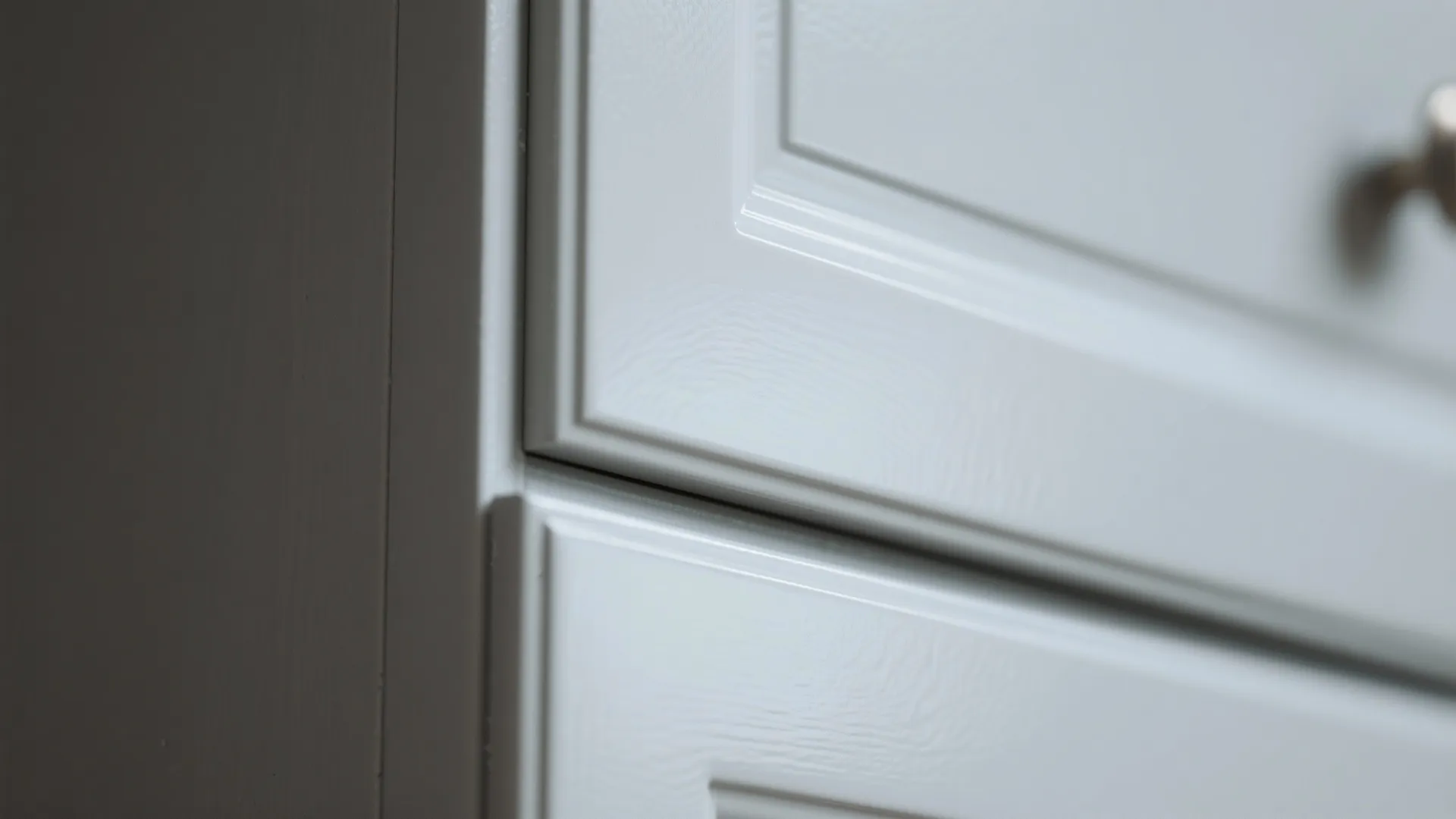 Close-up of smooth satin finish on cabinet painted with water-based alkyd enamel
