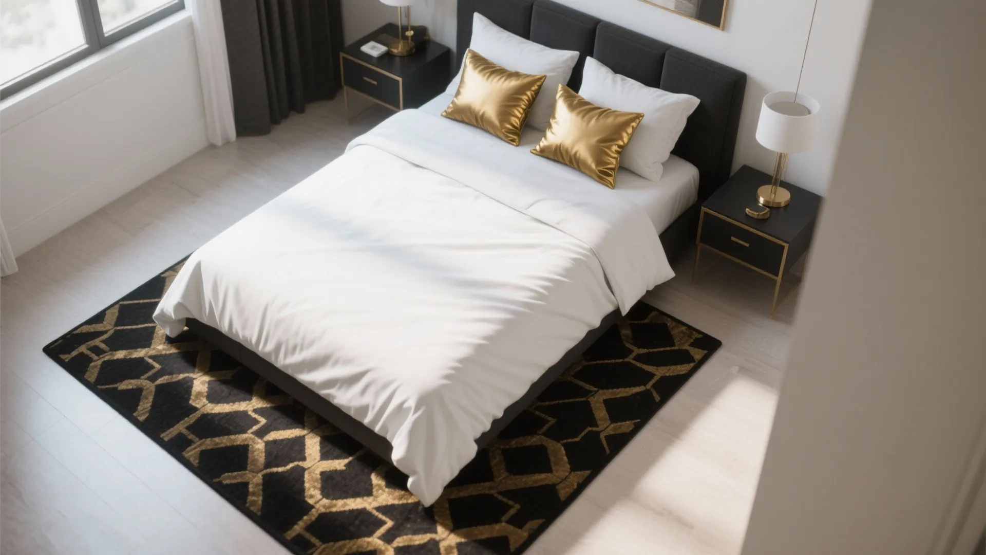 Top-down view of white bedding with black and gold patterned rug and gold-accent pillows