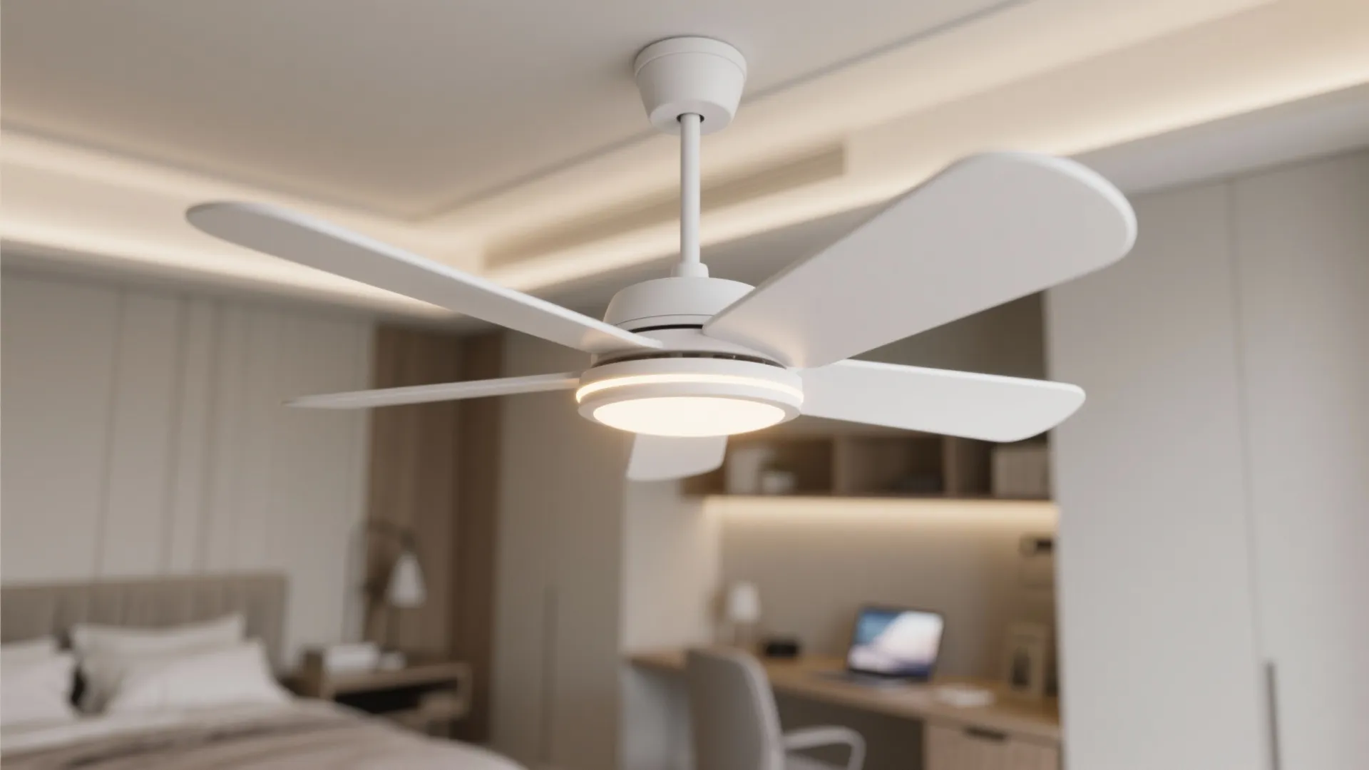 White ceiling fan with light fixture in modern bedroom with desk and soft blurred bed