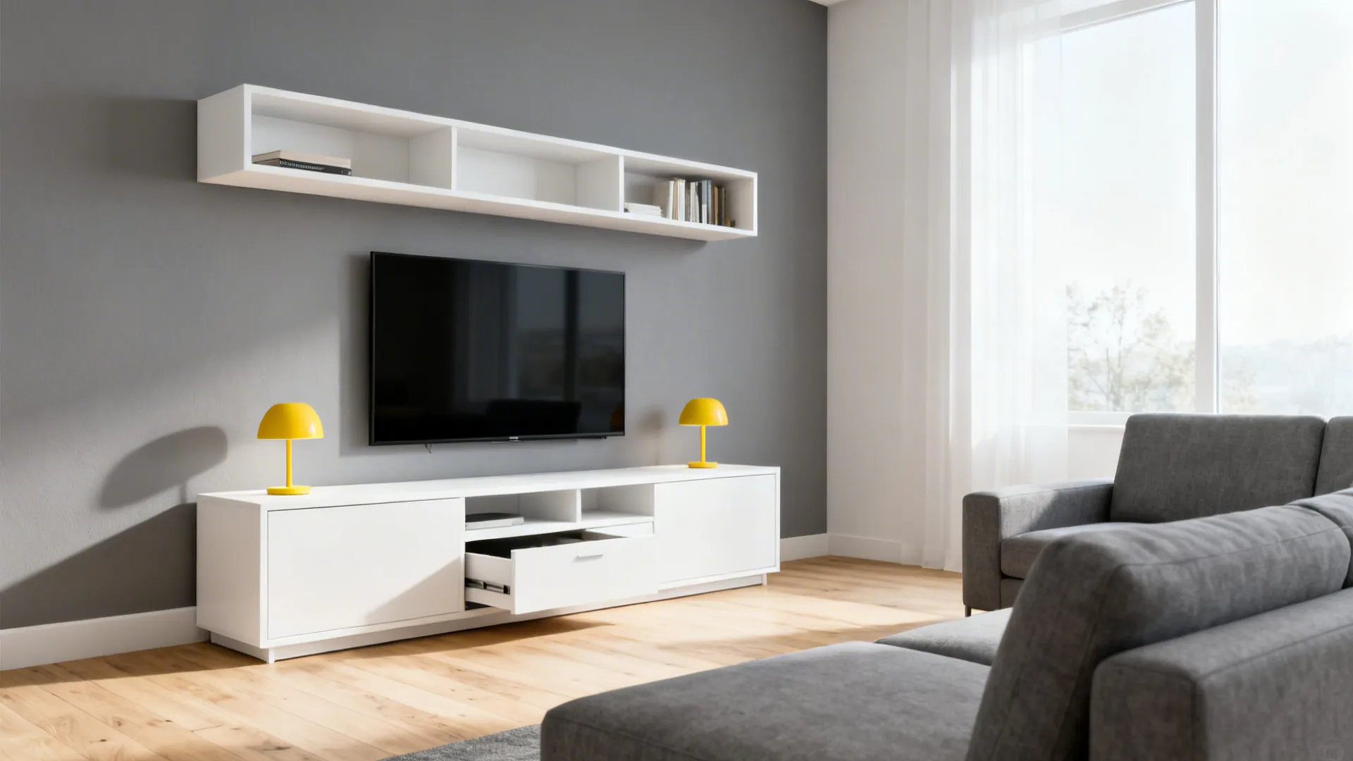 White media cabinet and shelving in a grey-walled living room with yellow lamps