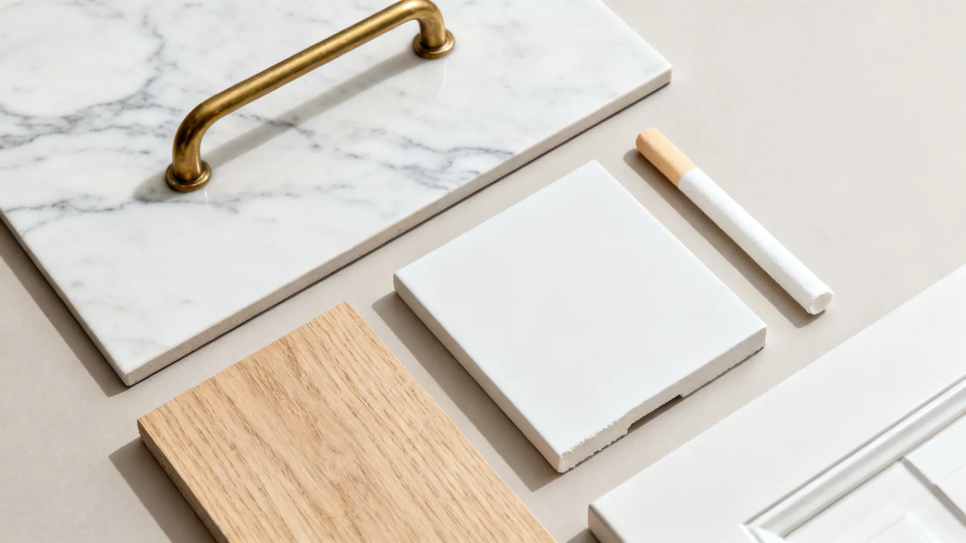Flatlay with marble-look porcelain tile, brass hardware, oak, and white finishes