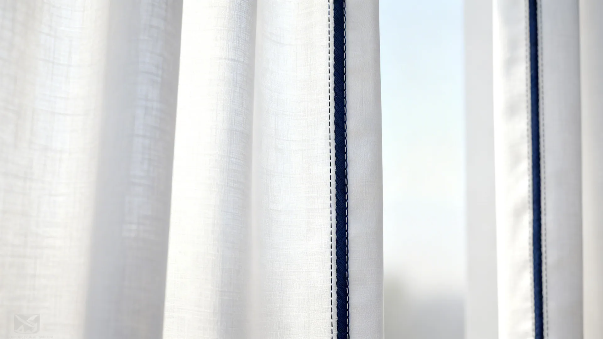 Close-up of white curtain with navy piping showing fabric texture and stitching