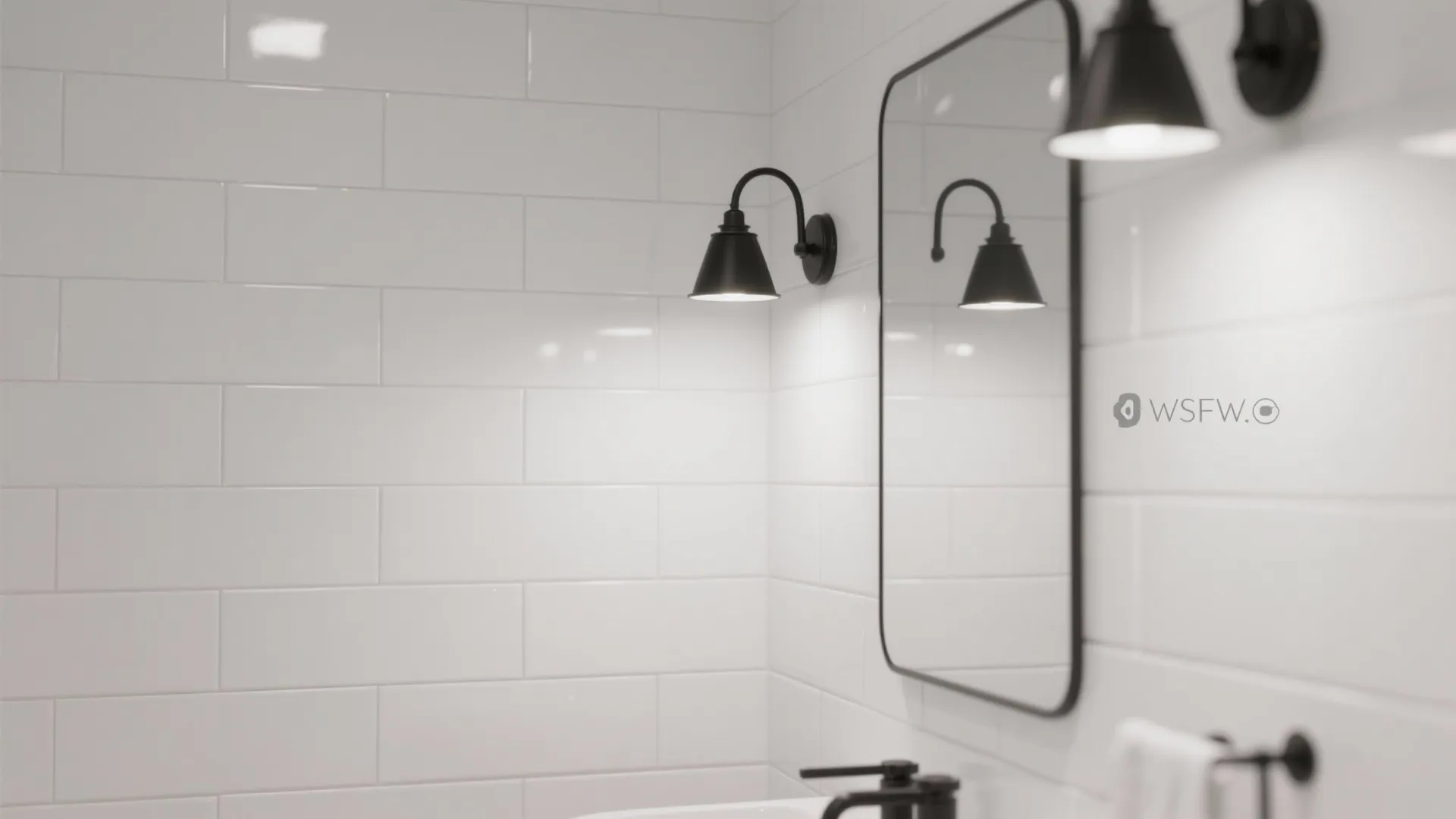 Modern bathroom featuring white brick wall tiles with black wall light fixtures and rectangular mirror