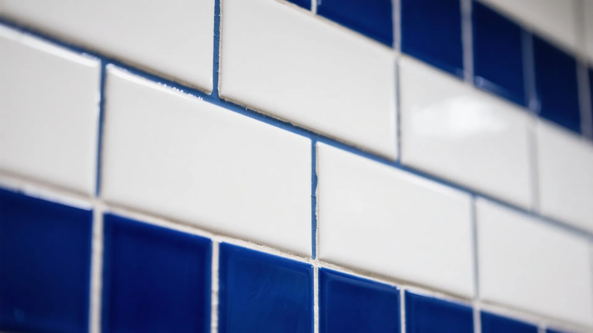 2. White Subway Tiles with Blue Grout