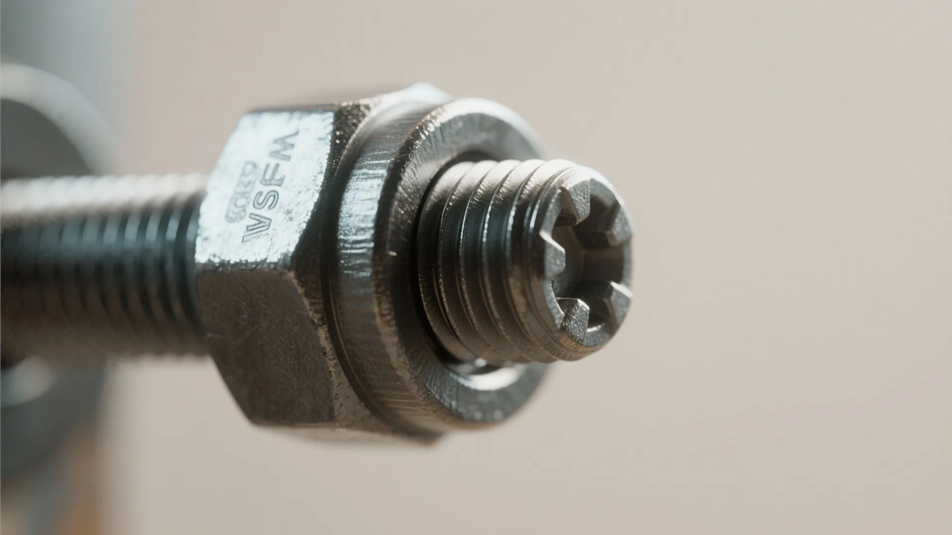 Close up view of a metal screw and nut used for assembling furniture and bathroom cabinets