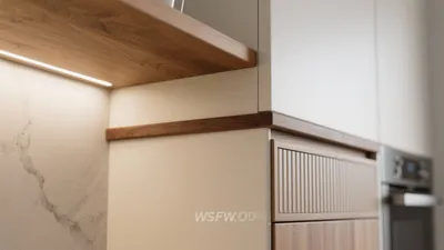 Modern Kitchen Cabinet Detail with Wood Accent