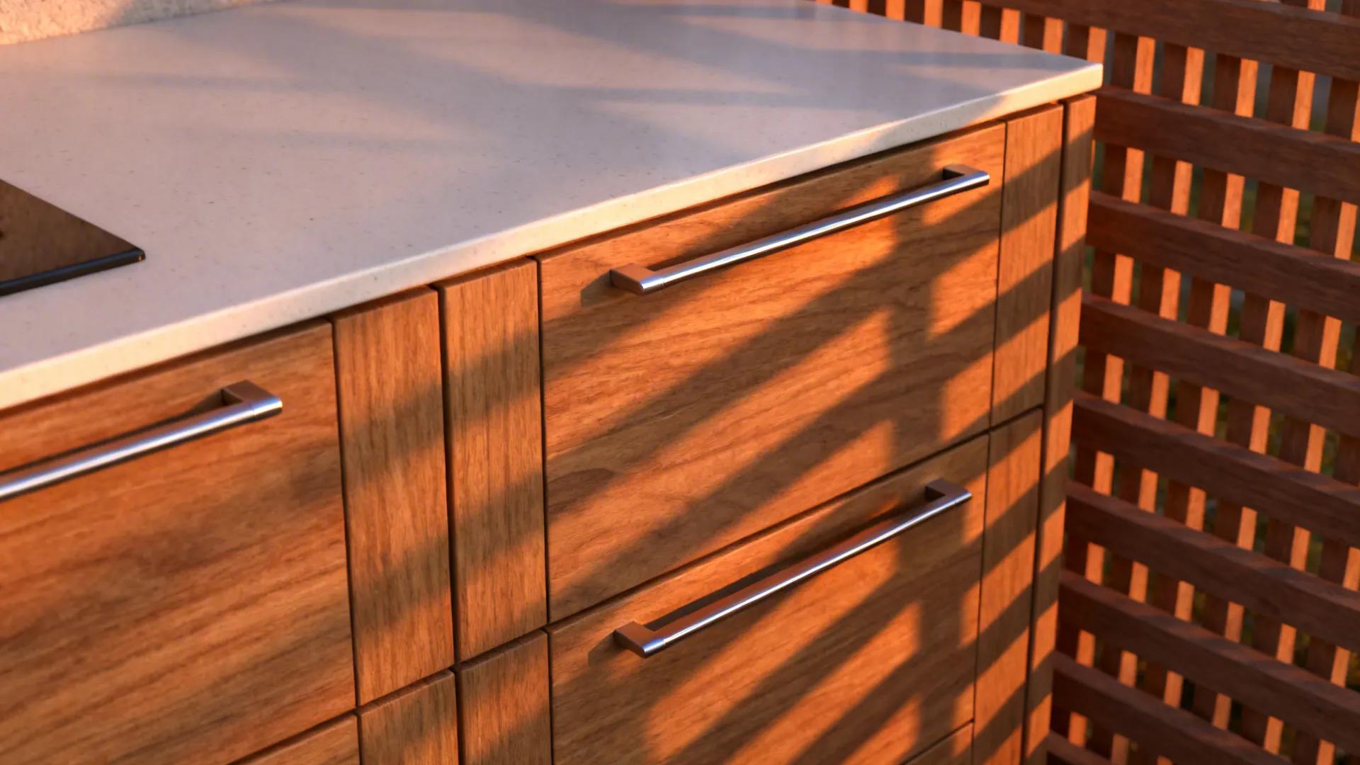 Close-up of thermally modified wood drawer fronts and a slatted screen beside a stone counter.