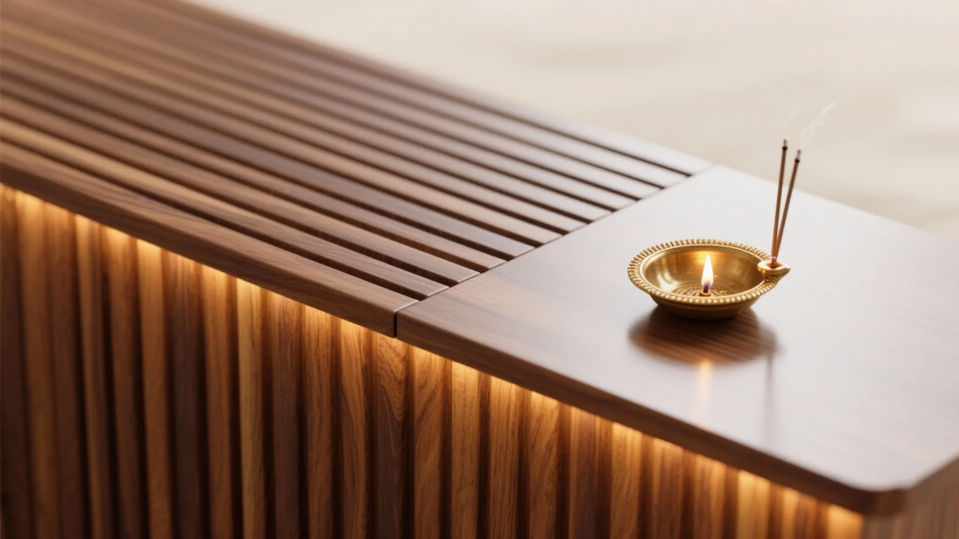 Close-up of wooden cabinet with warm lighting featuring a small brass lamp and incense sticks