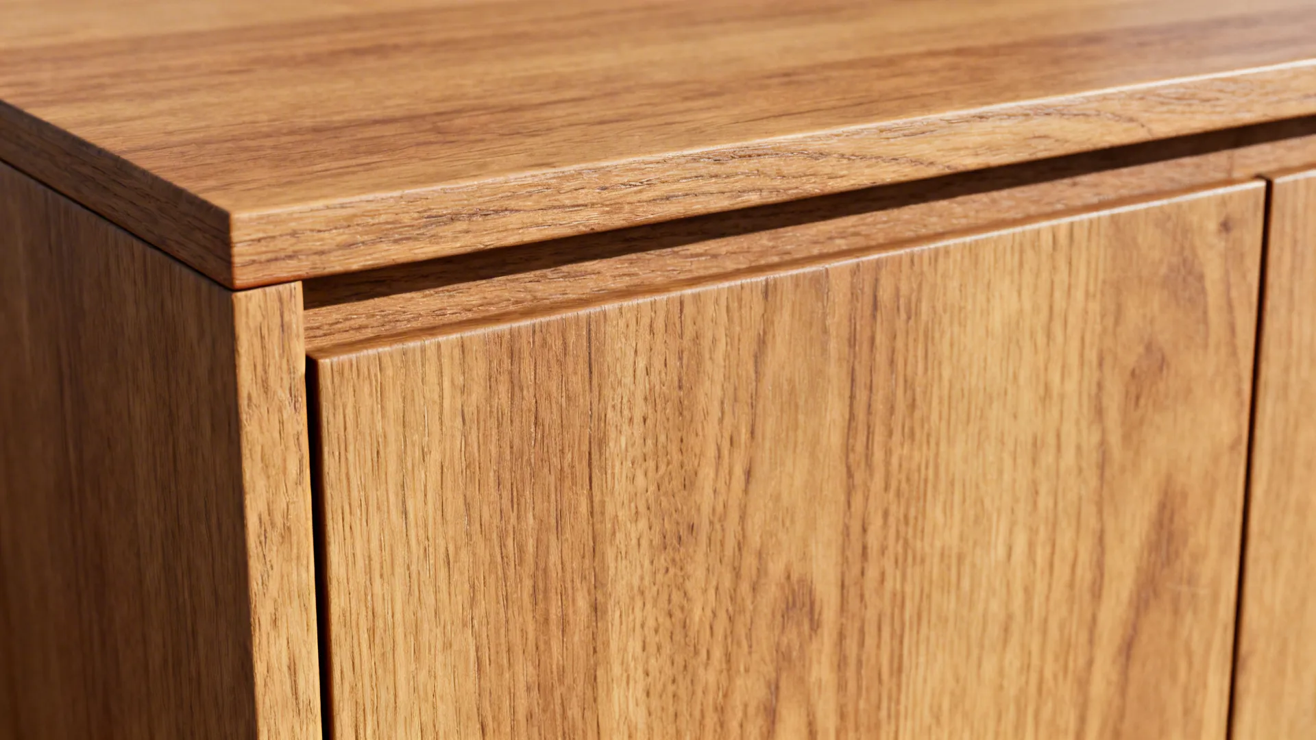 Macro of engineered wood-look cabinet with real wood edging and subtle oak grain texture.