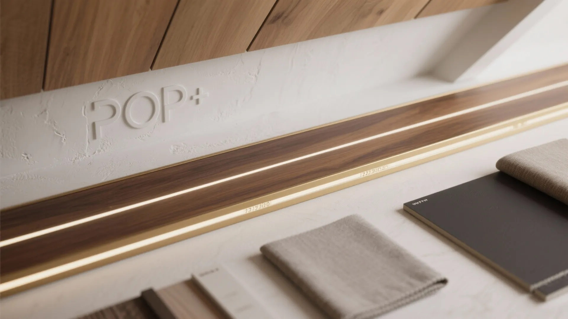 Interior design materials including wood panels metal trim fabric samples and notebooks on a white surface