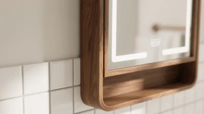 Modern Bathroom Mirror Design with Warm Wood Frame