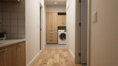 Modern Laundry Room with Wood Cabinetry and Smart Storage