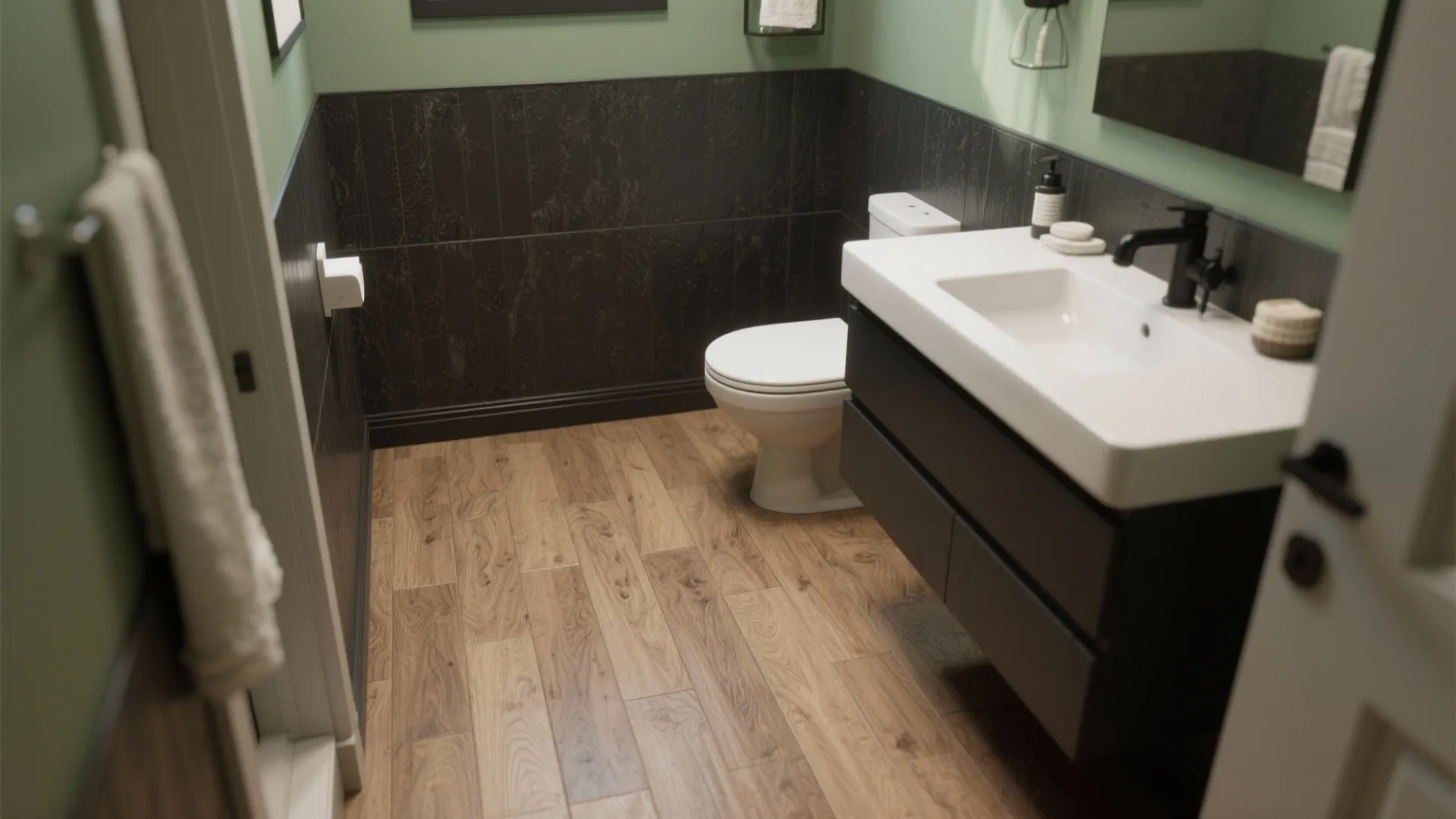 Small bathroom with oak-look vinyl planks, white vanity, and dark accent wall for contrast.