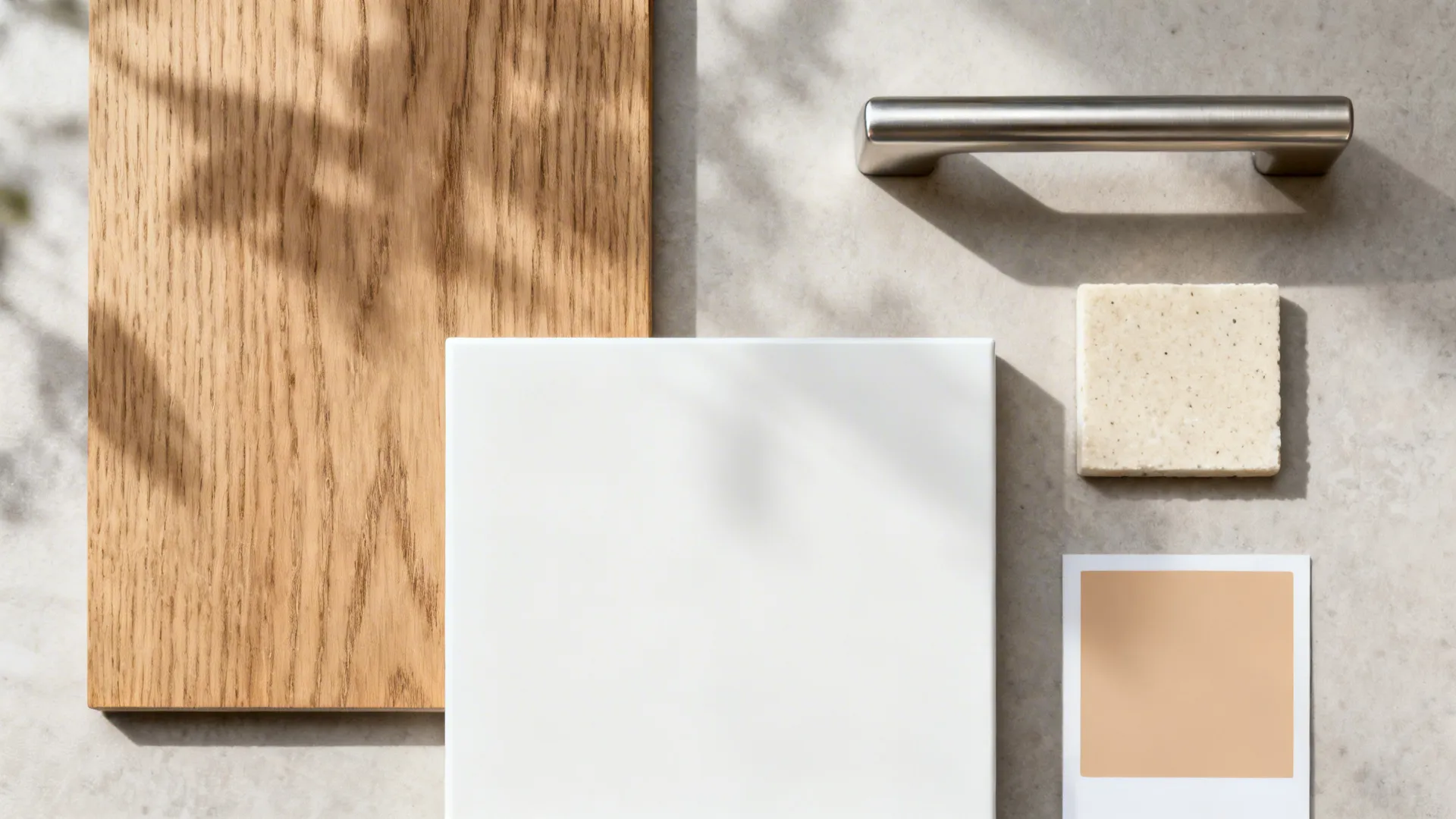 Material flat lay with rift-cut oak, matte white, light quartz, and warm neutral swatches.