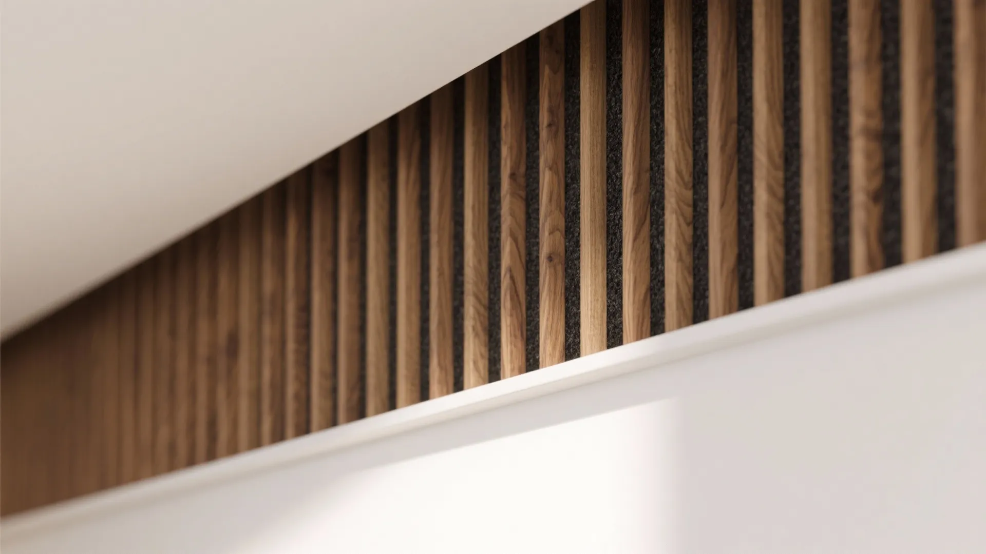 Close-up of vertical wood wall panels with black gaps between slats in a modern interior