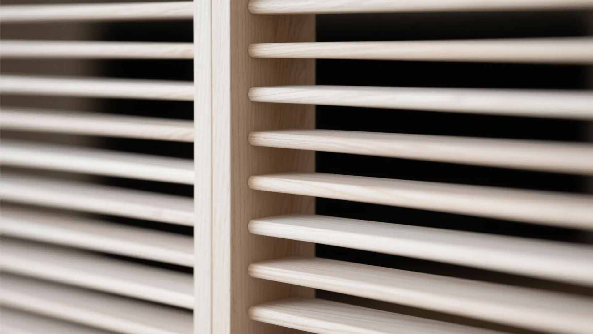 Macro of white-oak slats with even spacing and satin finish highlighting the grain.