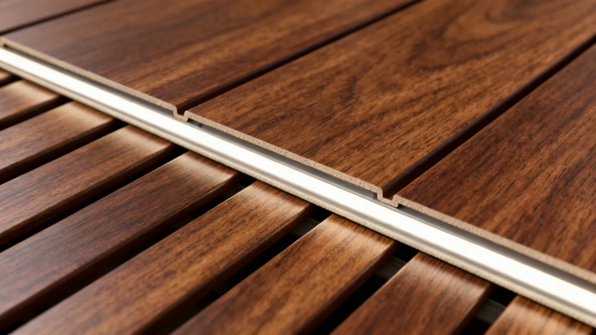 Macro of a wood-look PVC slat showing realistic walnut texture and clean shadow gaps.