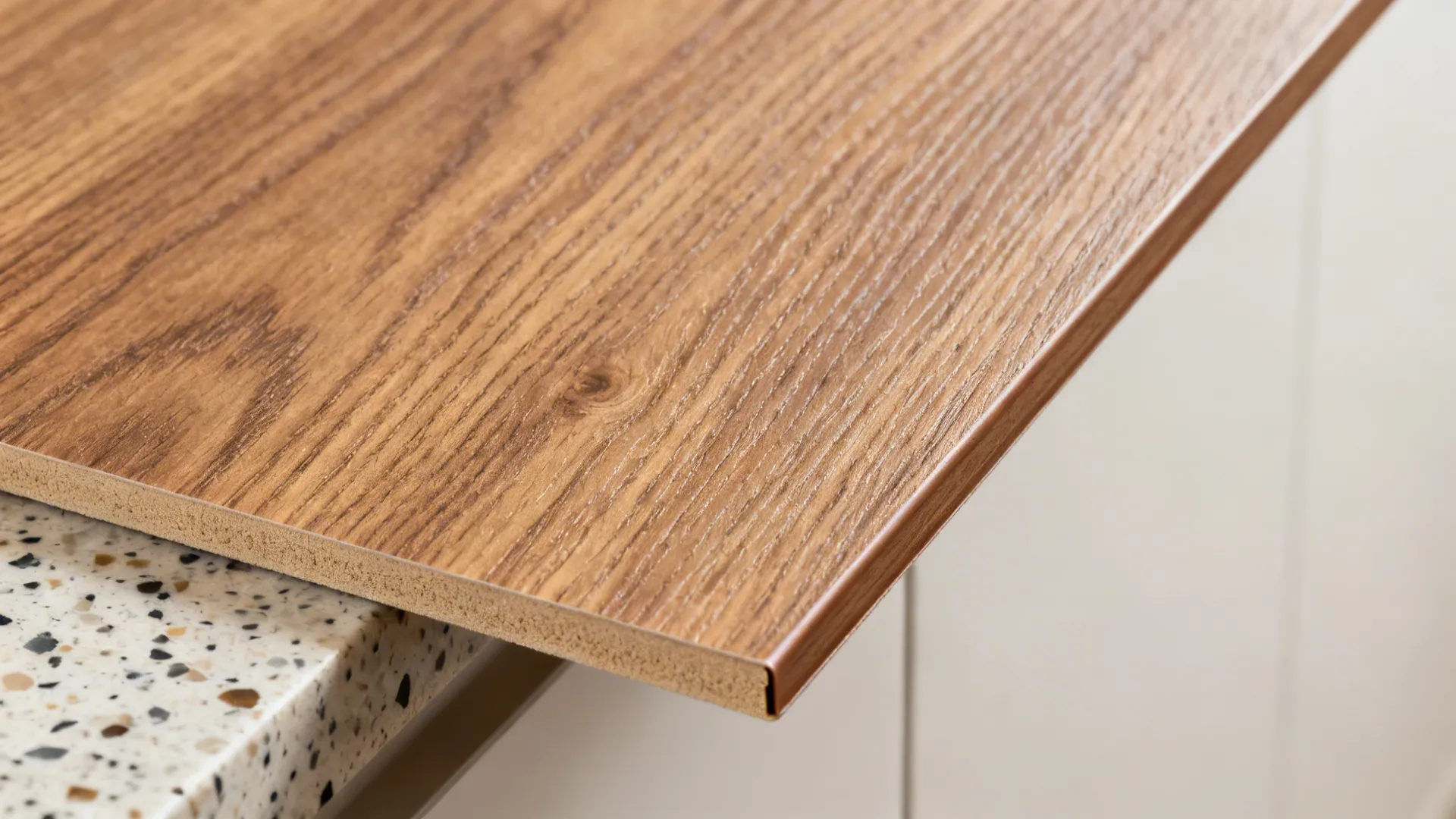 Macro of rift-oak wood-grain PVC door with synchronized pattern and clean edge.