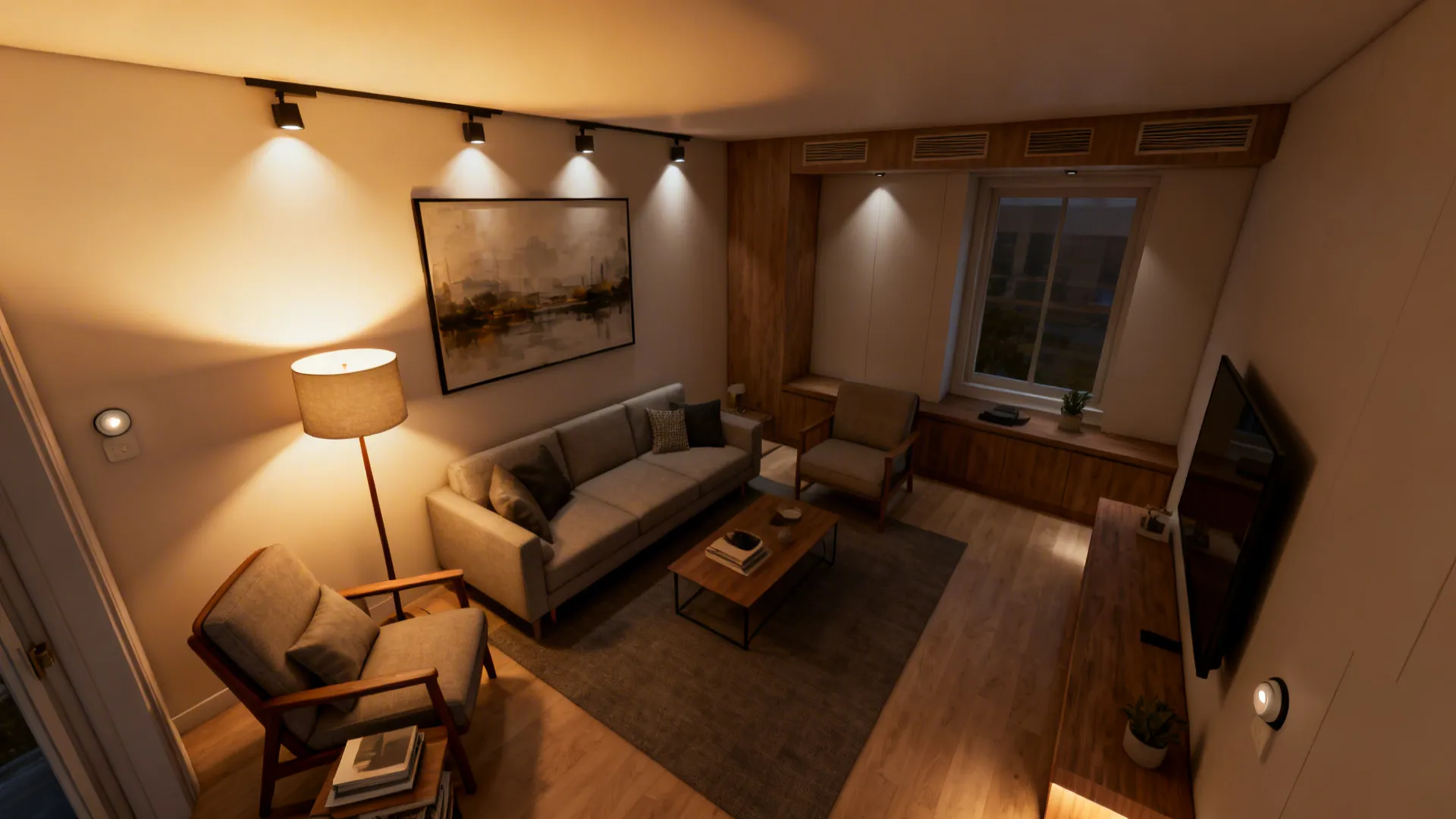 Top-down view showing layered lighting zones—ambient ceiling wash, picture lights, and a floor lamp in a compact room.