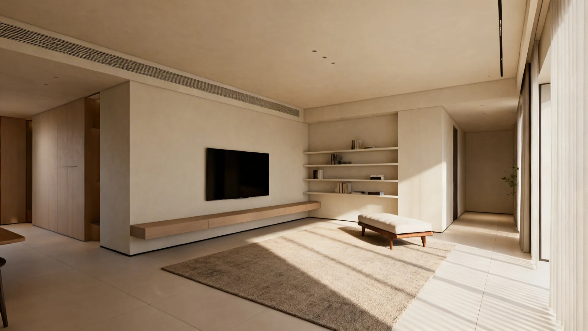 Small living area defined by a minimal rug and low floating shelves for storage