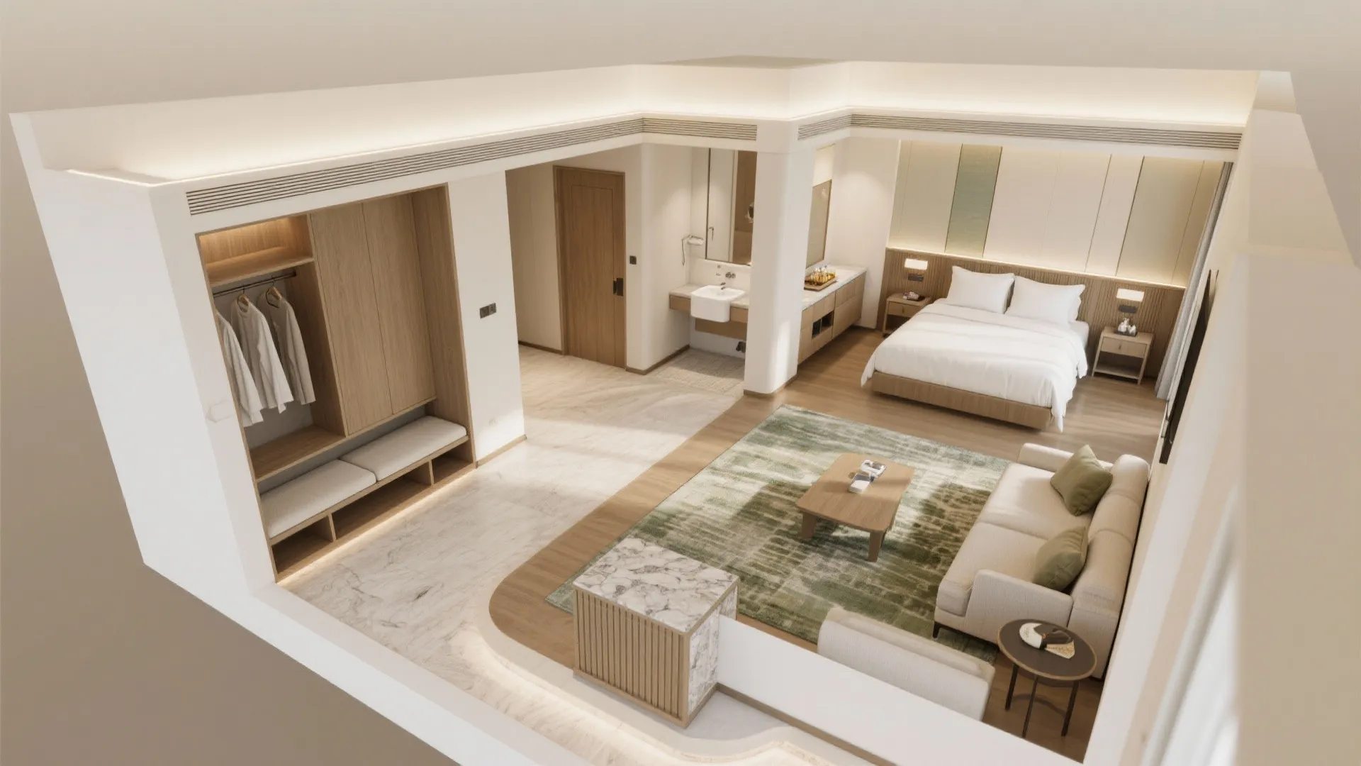 Top view of a hotel suite showing bedroom area with sofa and green rug and bathroom