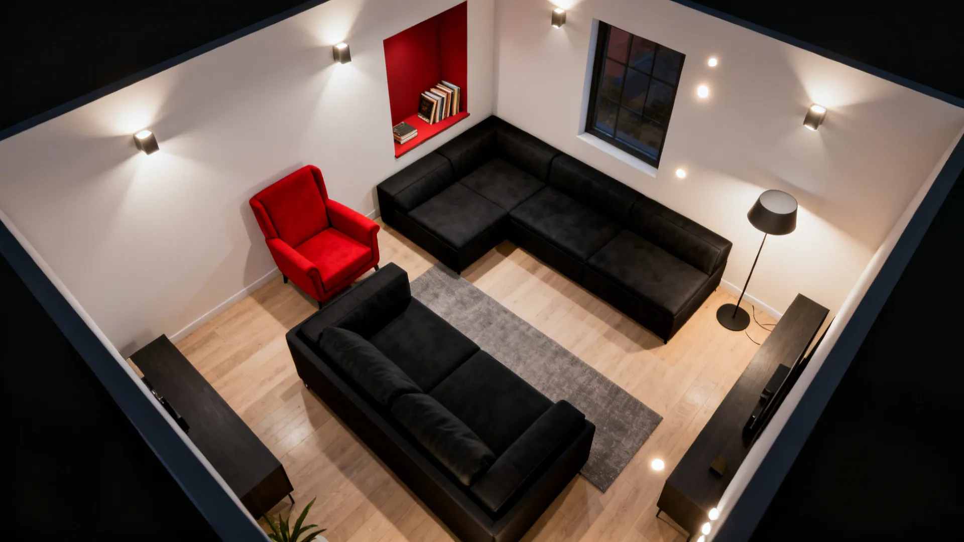 Modern living room layout with black sofas a red chair wood flooring and warm wall lights