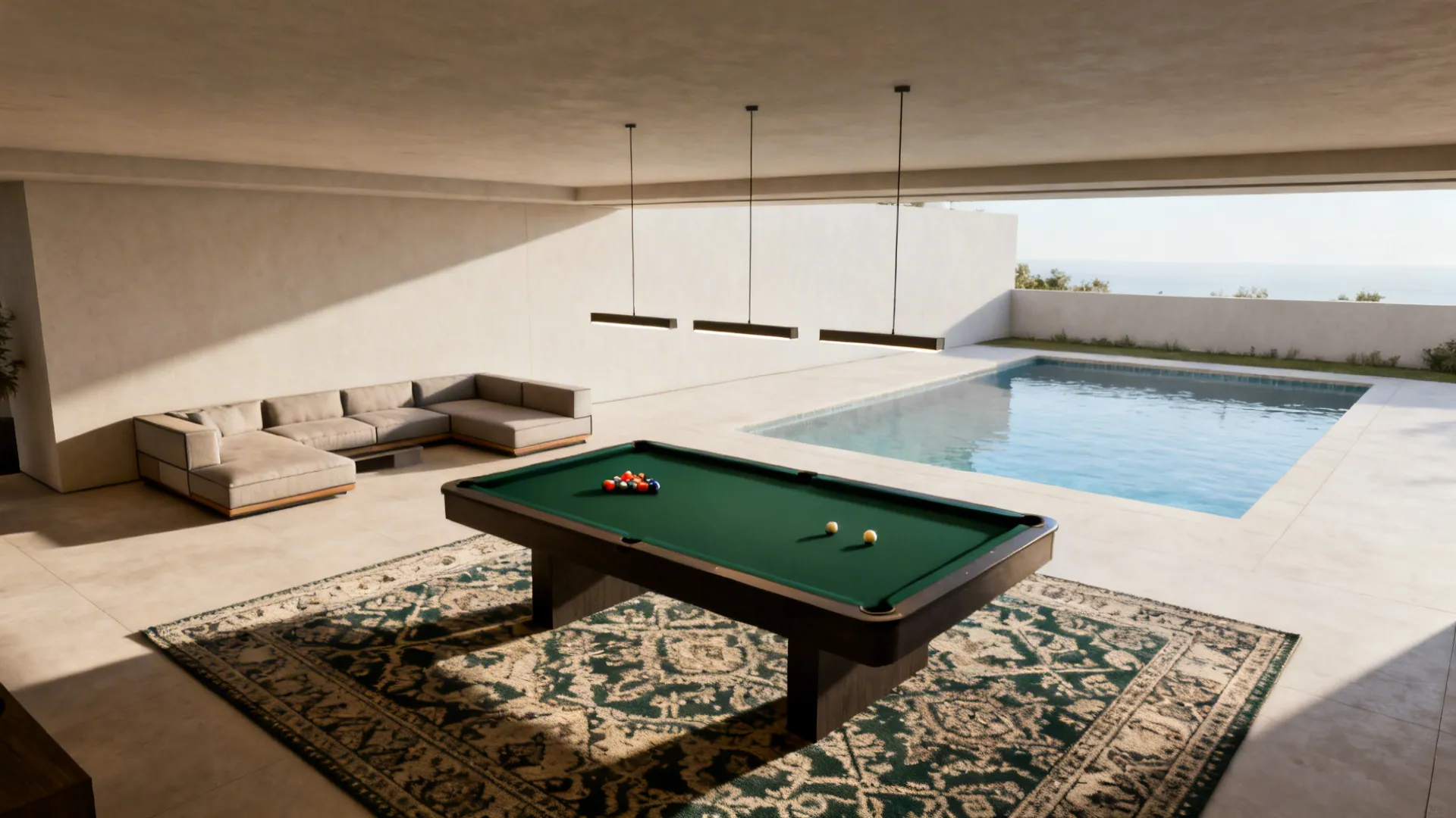 Pool table area defined by an oversized rug and a trio of pendant lights in a living room
