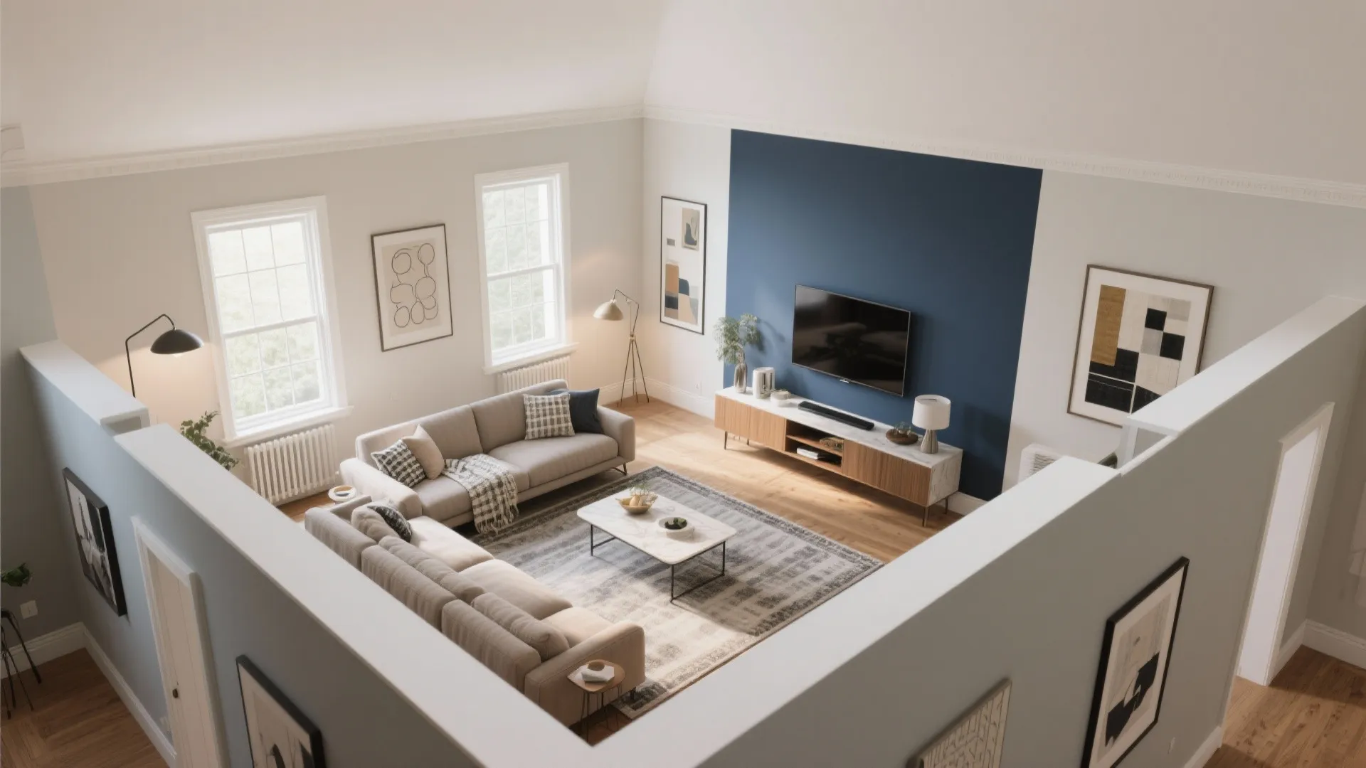 Spacious living room layout with large grey sofa blue feature wall wooden floor and white windows
