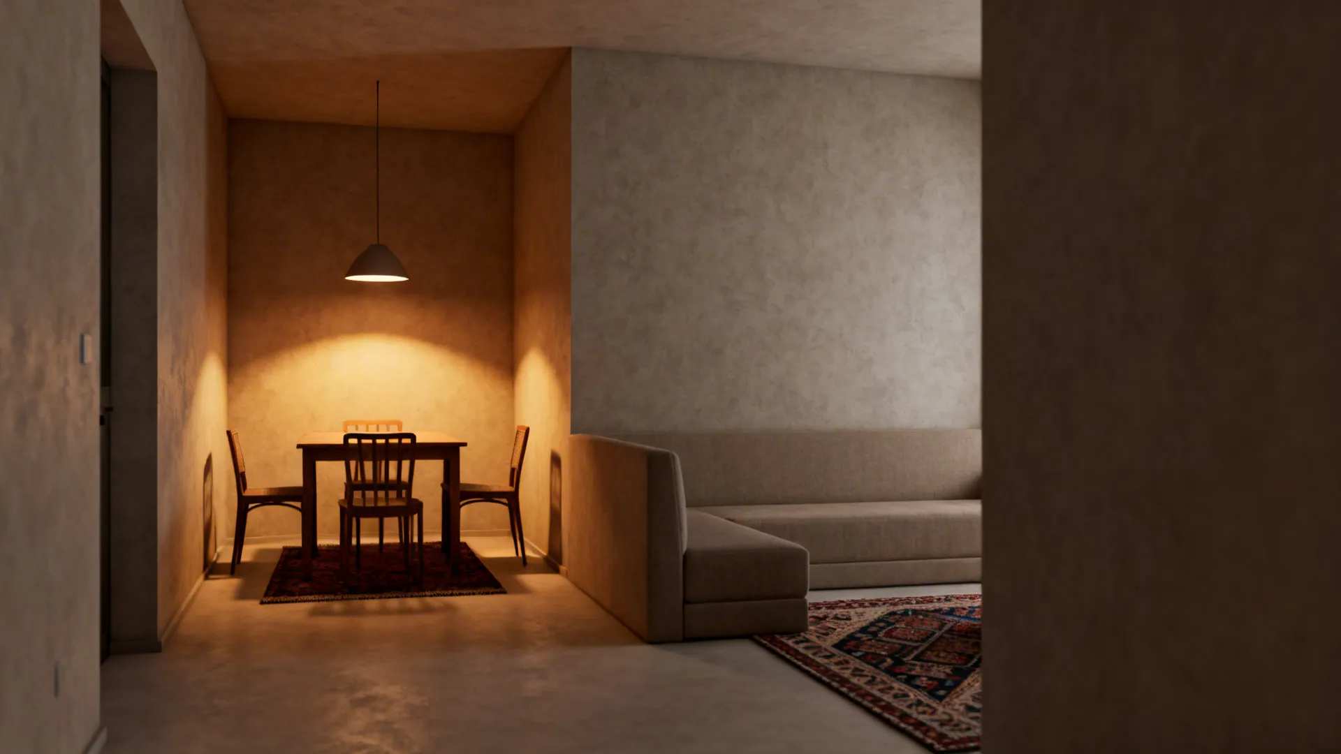 Small studio with dining zone defined by a rug and pendant lamp and a low-backed sofa divider