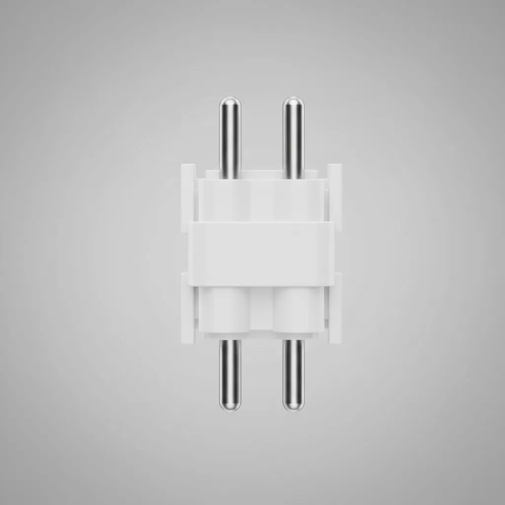 Close up view of a white plastic light bulb base showing four silver metal connecting pins