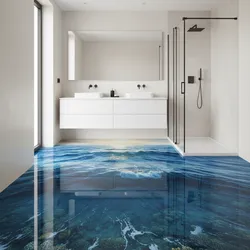 Modern white bathroom featuring double vanity and glass shower with creative 3D ocean floor design